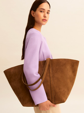 Forme pulite, materiali curati, design essenziale.  - Emme